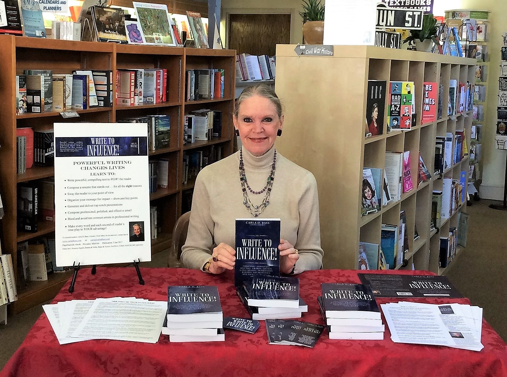 Author Signing at Winchester Book Gallery Carla D. Bass, author of award-winning book Write to Influence! signs books at a book store